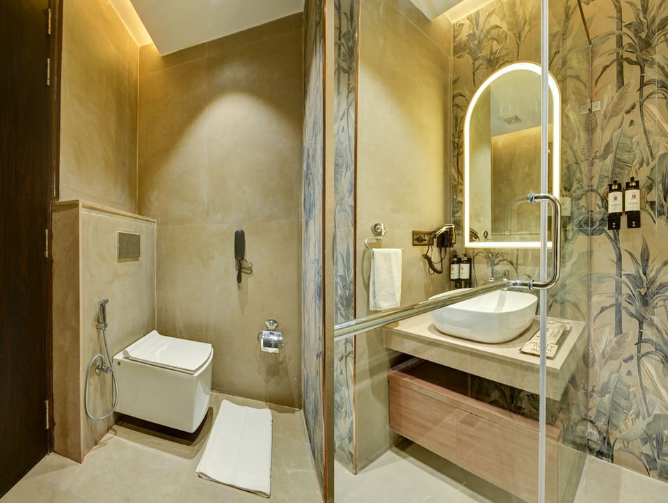 Shower, hair dryer, slippers, towels