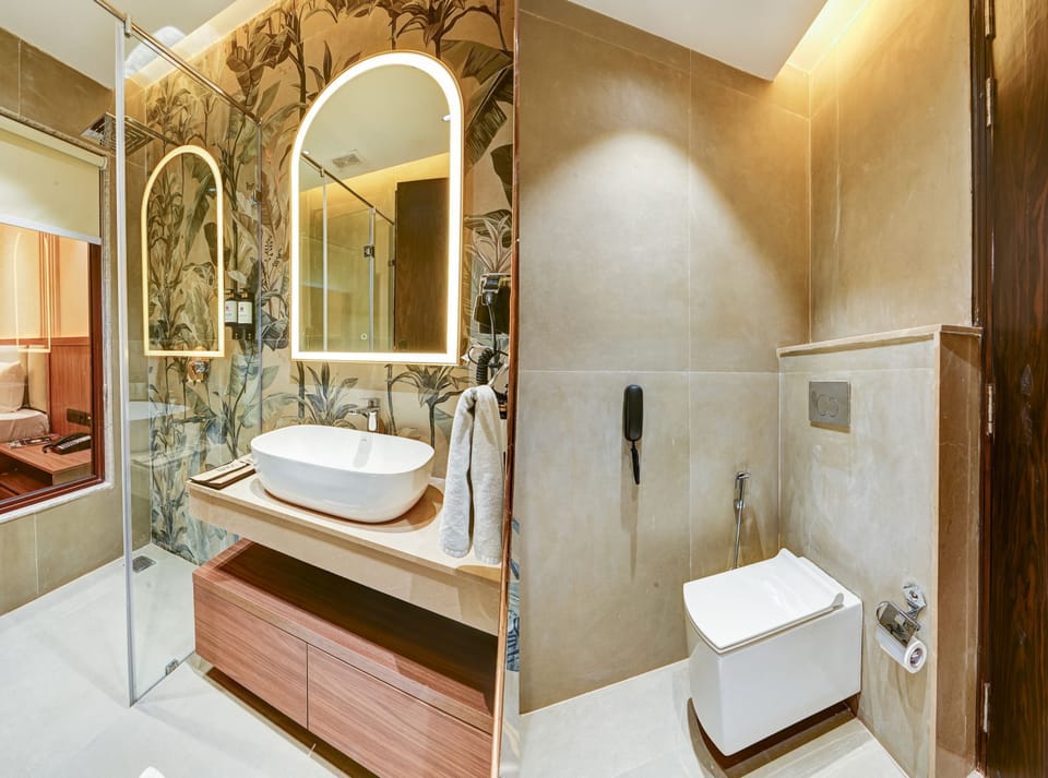 Shower, hair dryer, slippers, towels