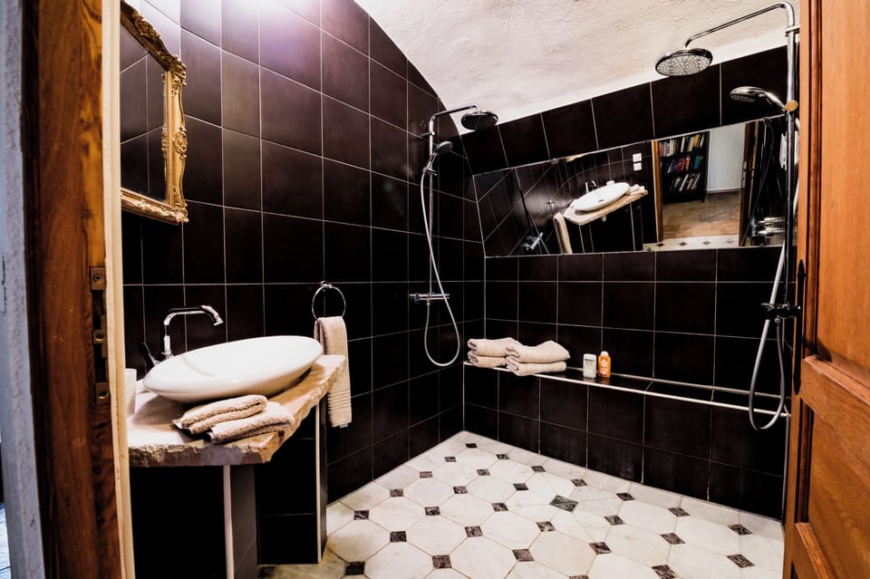 Family Apartment, Patio, Garden View | Bathroom | Free toiletries, bathrobes, slippers, soap