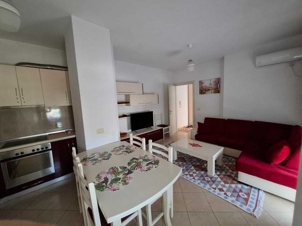 Family Apartment, Balcony, City View | Living area | 32-inch Smart TV with digital channels