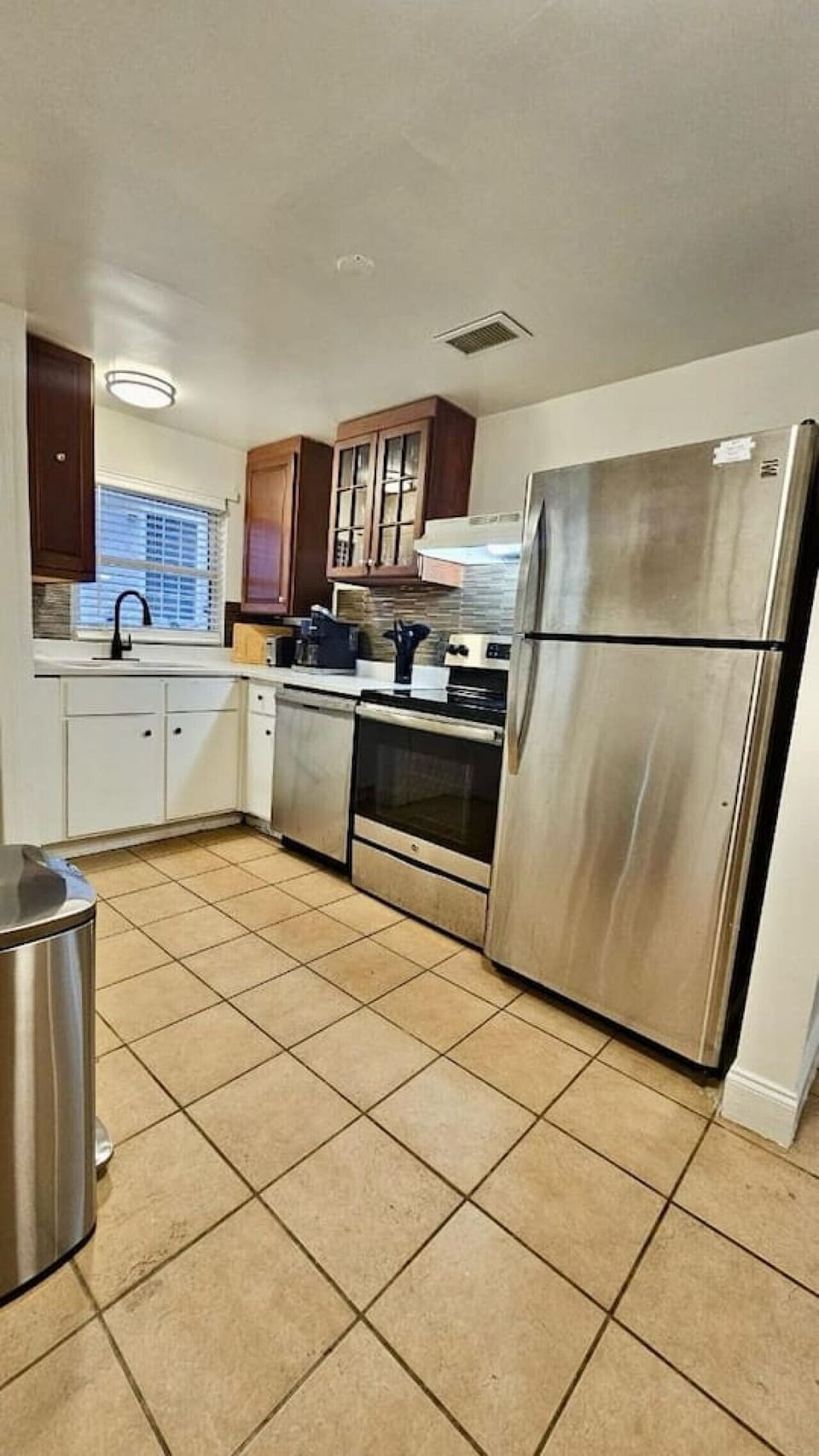 Next, you’ll see the kitchen—fully equipped with top appliances and all the essentials for your cooking needs.