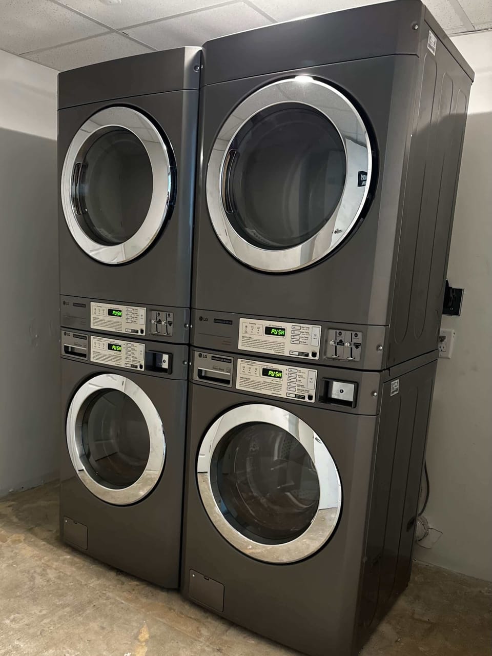 Coin operated laundry on the second floor outside the elevator