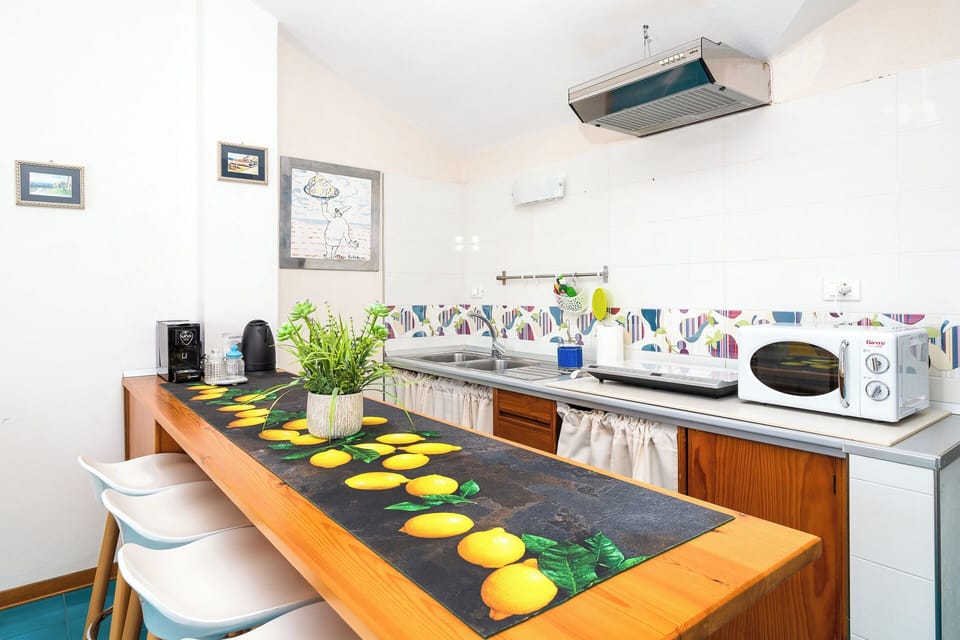 Panoramic Apartment, Partial Sea View | Private kitchenette | Espresso maker, electric kettle
