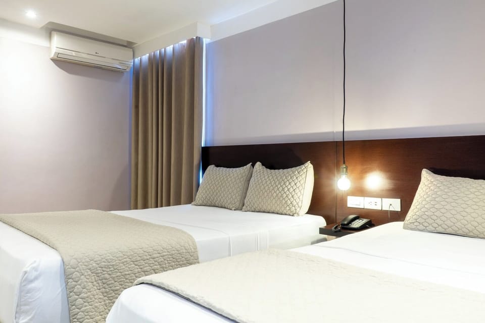 Deluxe Triple Room | Premium bedding, Select Comfort beds, iron/ironing board (on request)