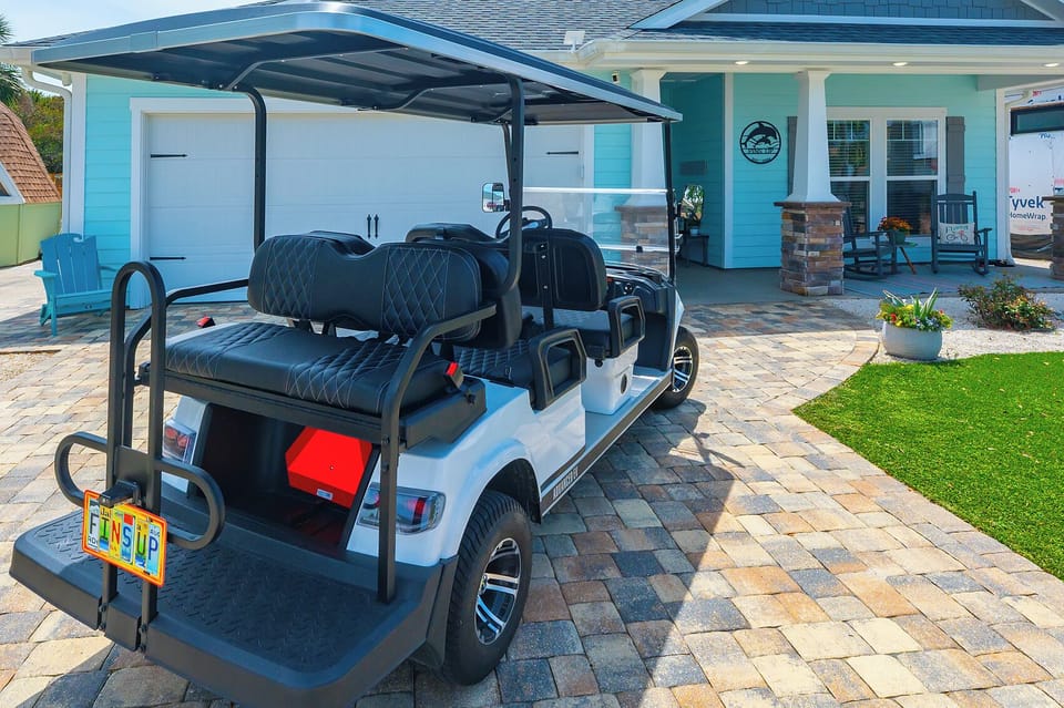 Fins Up! 6 person golf cart makes your neighborhood cruising or beach trip easy and fun. Load up and go!