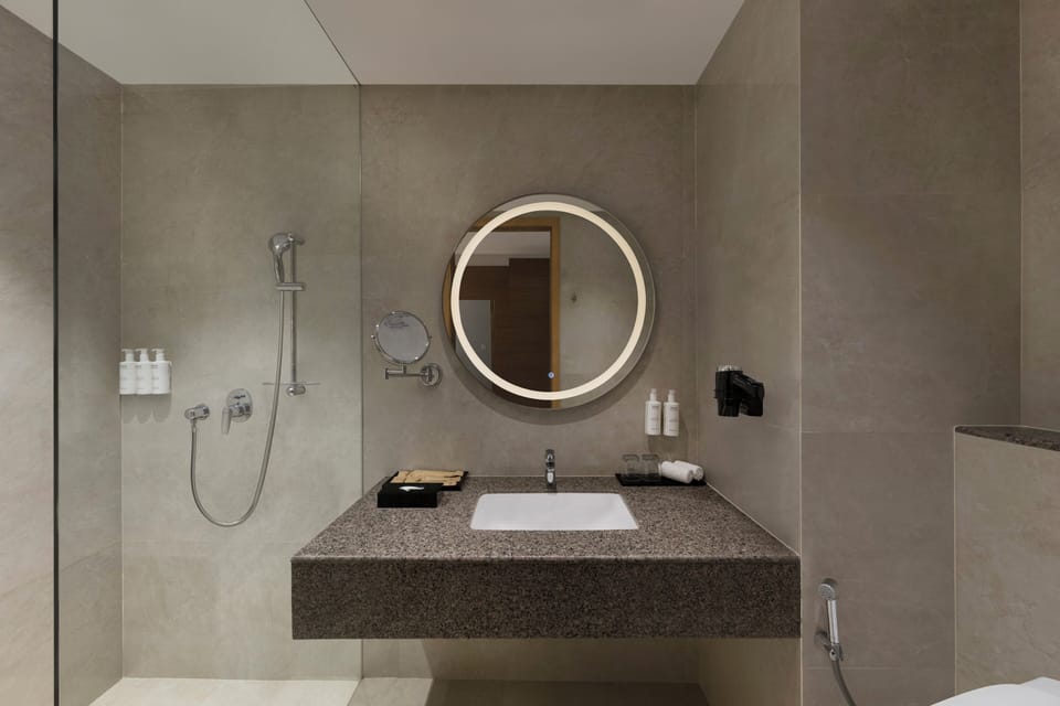 Shower, rainfall showerhead, eco-friendly toiletries, hair dryer