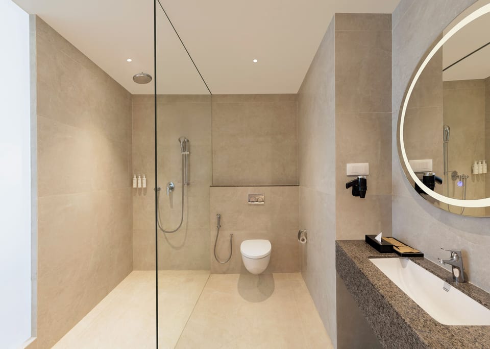 Shower, rainfall showerhead, eco-friendly toiletries, hair dryer