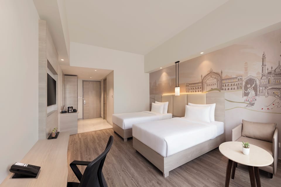 Classic Twin Room | Minibar, in-room safe, desk, laptop workspace