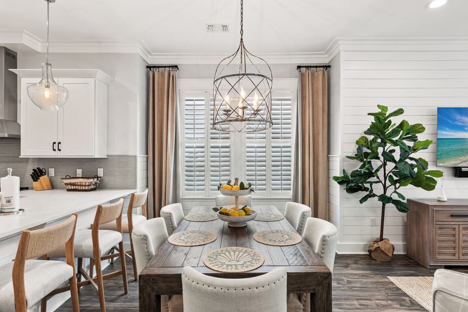 Your elegant dining space awaits with warm lighting and stunning decor, perfect for memorable meals together.