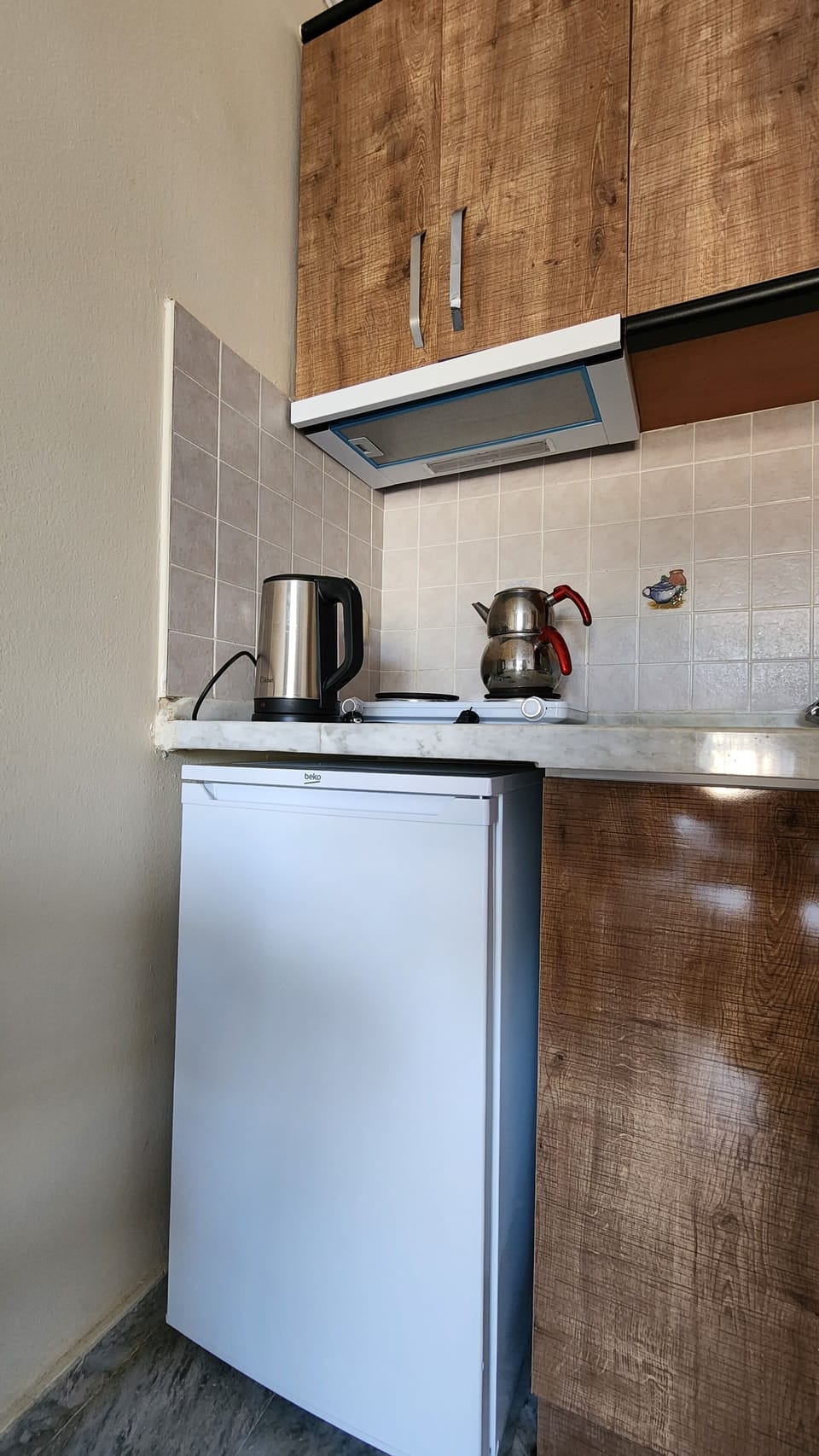 Apartment | Private kitchen | Mini-fridge, stovetop, cookware/dishes/utensils