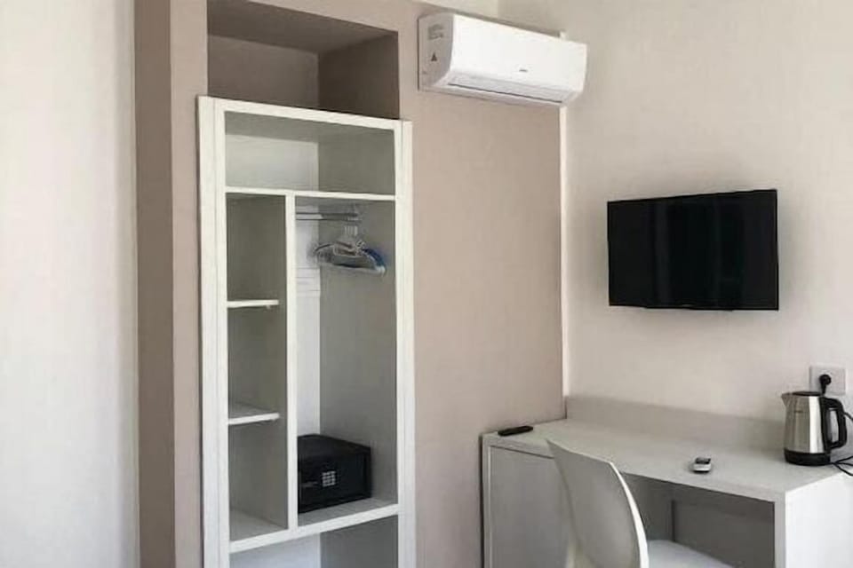Deluxe Double Room, Balcony, City View | In-room safe, desk, laptop workspace, free WiFi