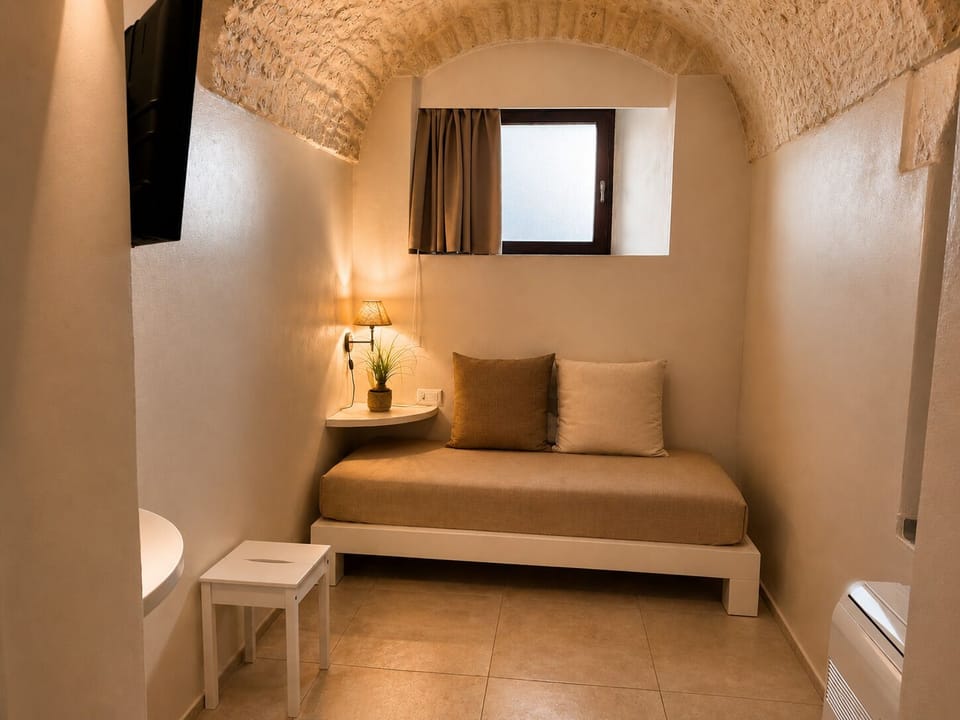 Superior Room | Living area | 40-inch flat-screen TV with digital channels