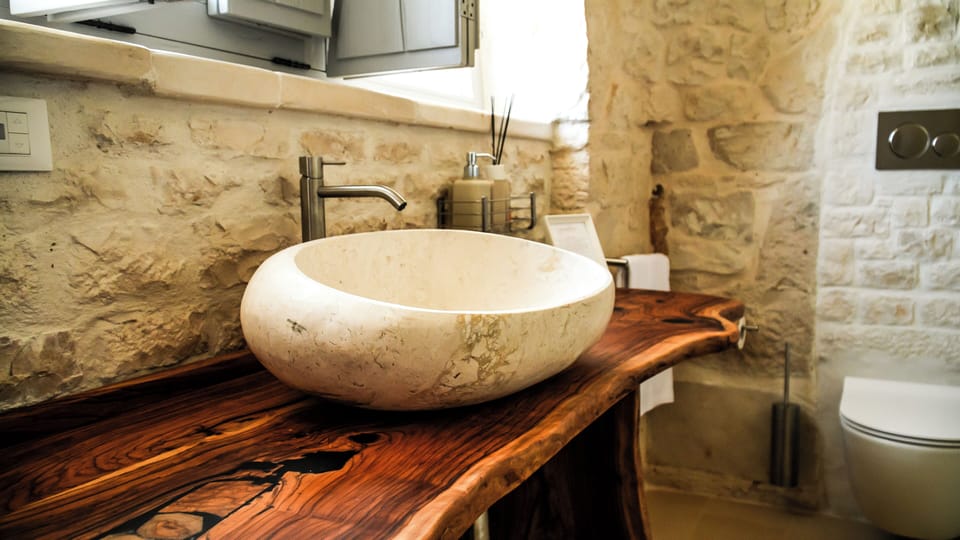 Shower, hair dryer, slippers, towels