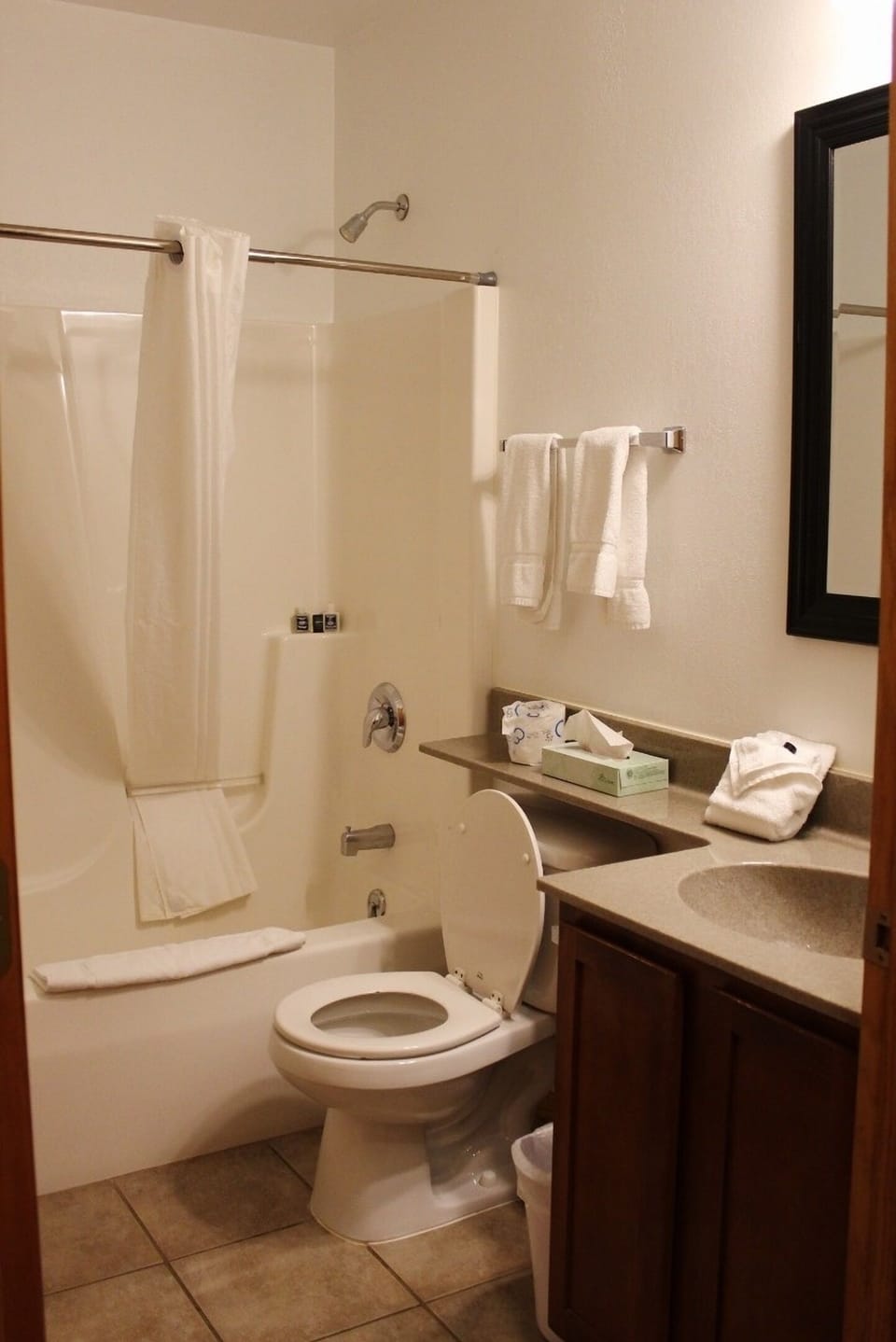 Refresh after adventures with a spotless tub and plush towels.