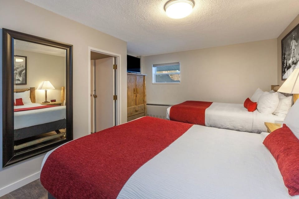 Stretch out and settle in with two beds and TV.