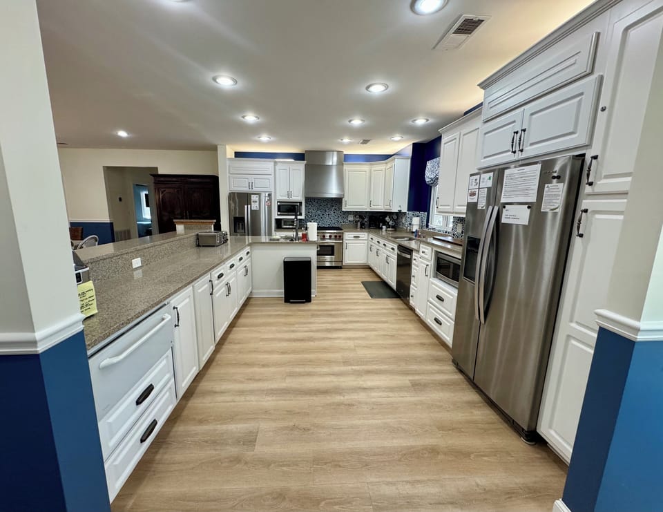 2 refrigerators in this extra large kitchen!