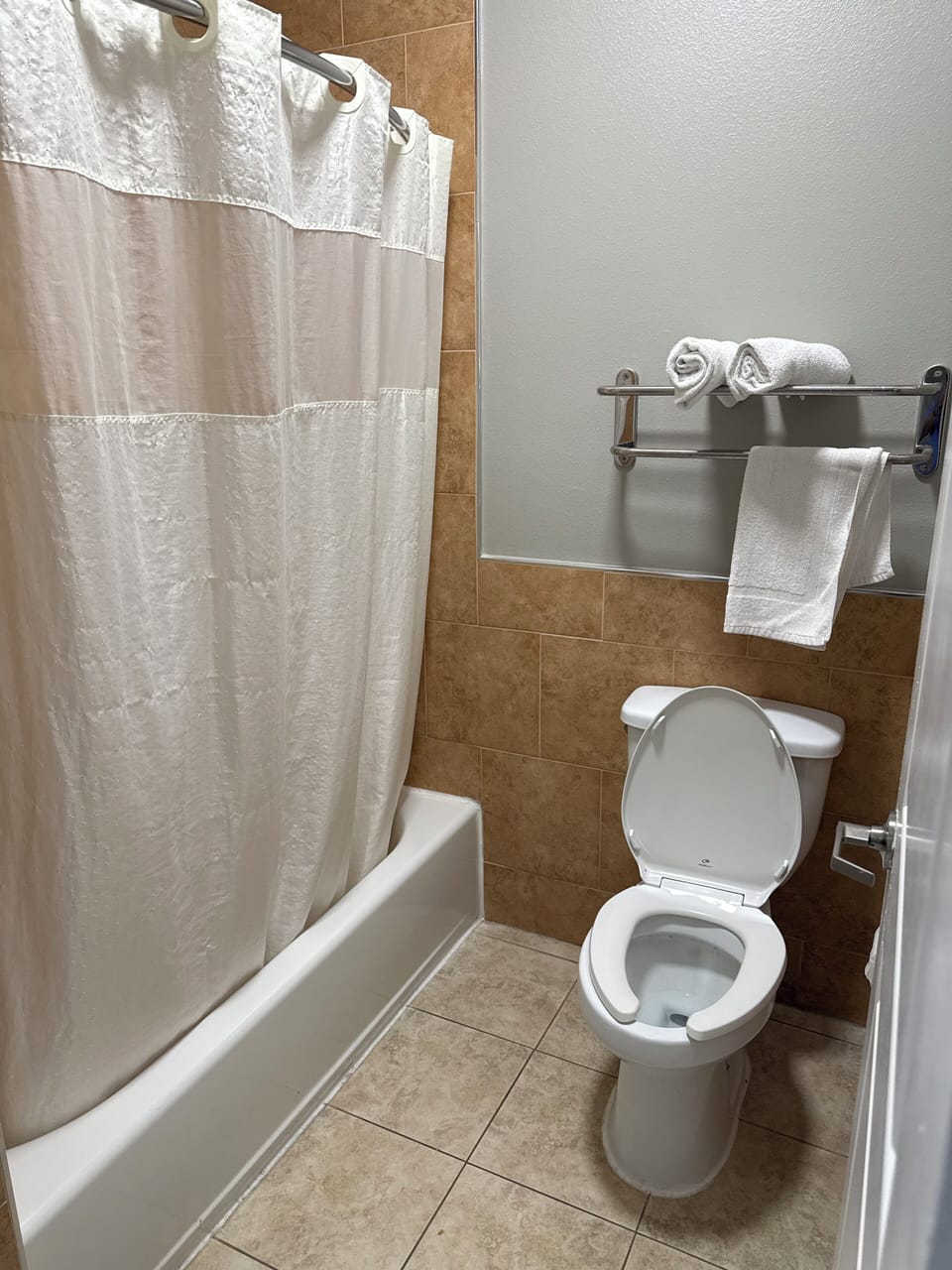 Basic Room, 1 King Bed, Non Smoking | Bathroom | Bathtub, hair dryer, towels, soap