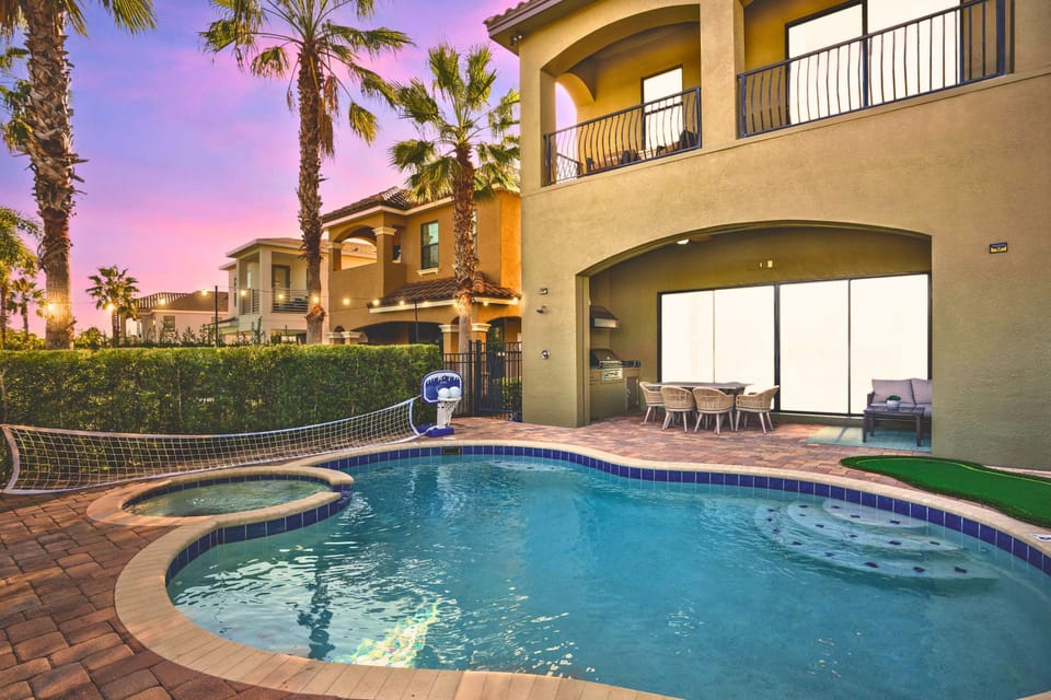Private pool and hot tub, overlooking 9th hole of Jack Nicklaus golf course in Reunion Resort. 