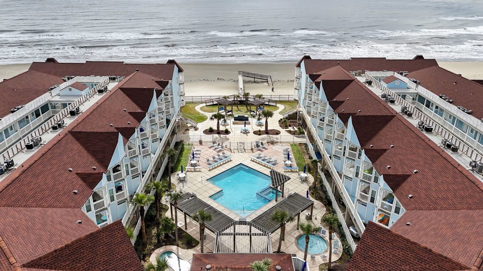 Access to community pools as well as beach access cross over bridge.