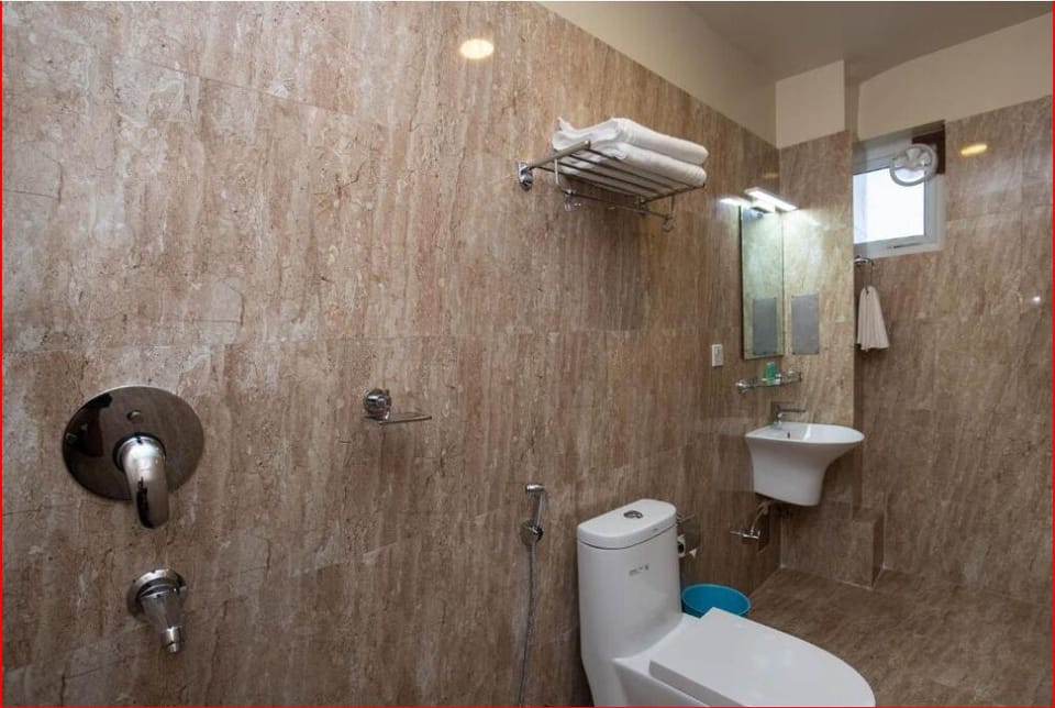 Shower, rainfall showerhead, eco-friendly toiletries, hair dryer