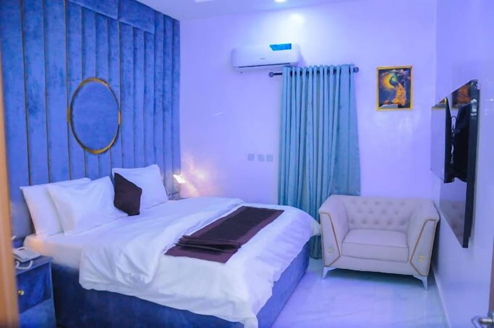 Deluxe Room, Balcony, City View | Desk, laptop workspace, blackout drapes, soundproofing