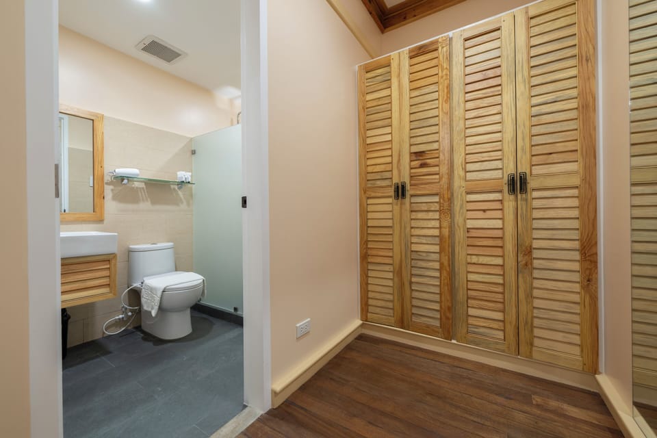 Junior Suite, Multiple Beds | Bathroom | Shower, hair dryer, slippers, bidet