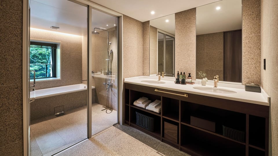 Glamday Suite Nonsmoking | Bathroom | Separate tub and shower, free toiletries, hair dryer, slippers