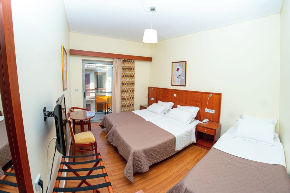 Deluxe Triple Room | Premium bedding, in-room safe, desk, laptop workspace