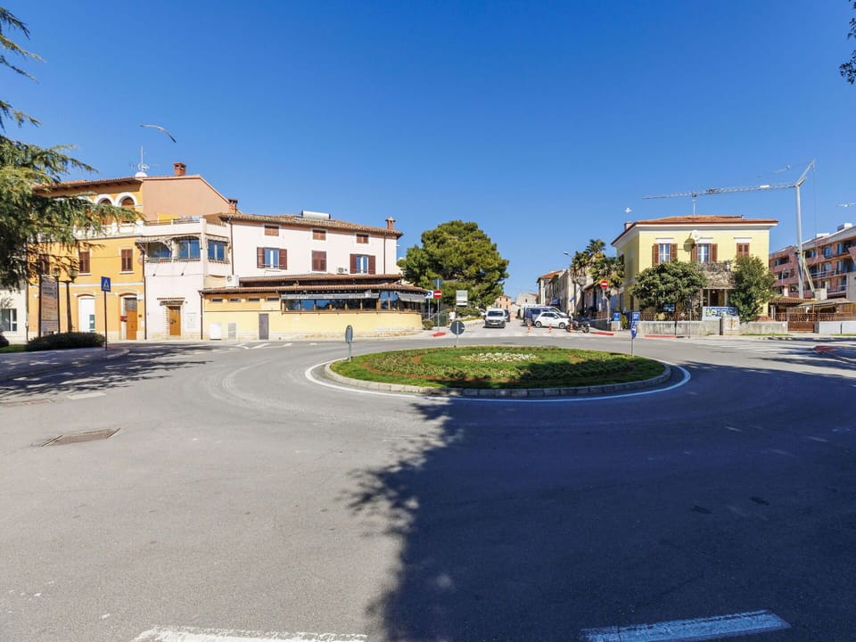 Sky, Road Surface, Road, Street, Asphalt, Town, Public Space, Neighbourhood, Residential Area, Human Settlement