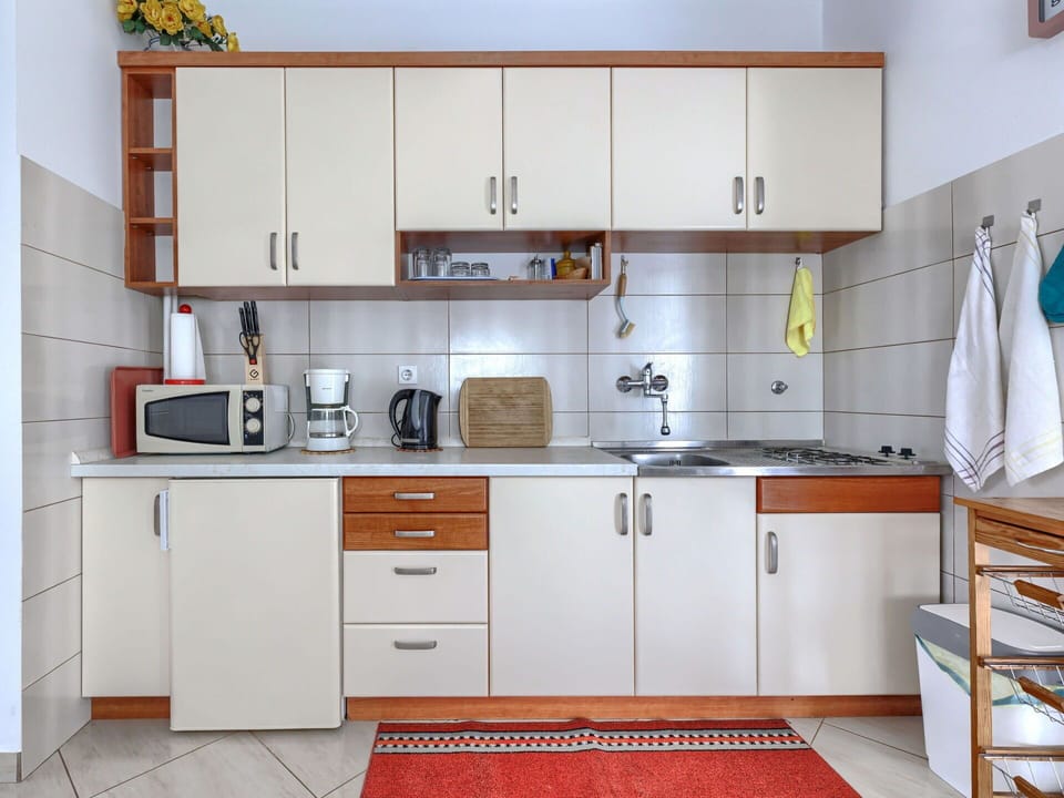 Cabinetry, Furniture, Kitchen, Wood, Countertop, Sink, Flooring, Kitchen Sink, Interior Design, Plumbing Fixture
