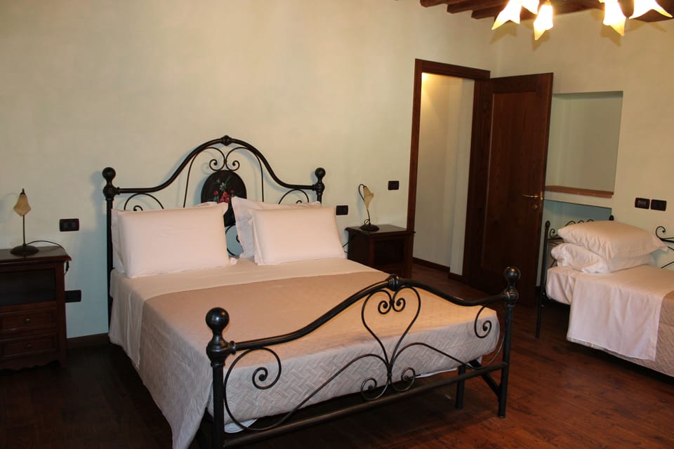 Standard Triple Room | Down comforters, in-room safe, desk, bed sheets