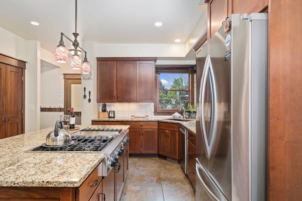 Chef's Kitchen | Stainless Steel Appliances and Kitchen Island (main level)