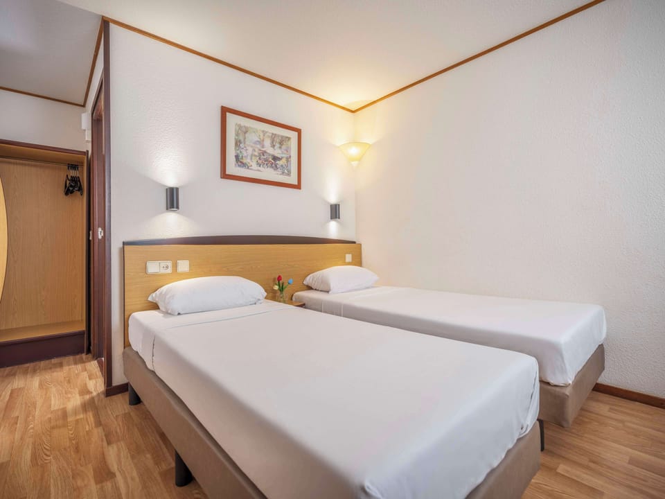 Standard Room, 2 Twin Beds | Desk, blackout drapes, soundproofing, iron/ironing board