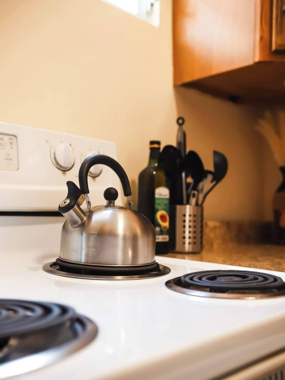 A tea kettle can be found in all three units