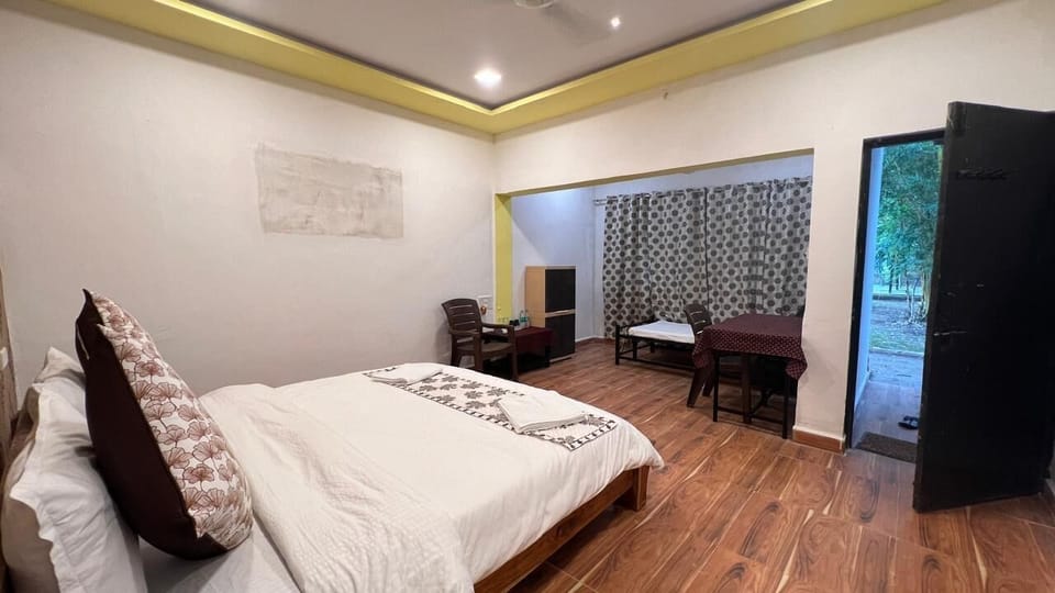 Superior Triple Room, Garden View | Laptop workspace