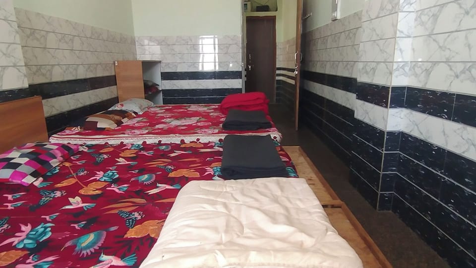 Double or Twin Room, City View | Memory foam beds, laptop workspace, WiFi (free)