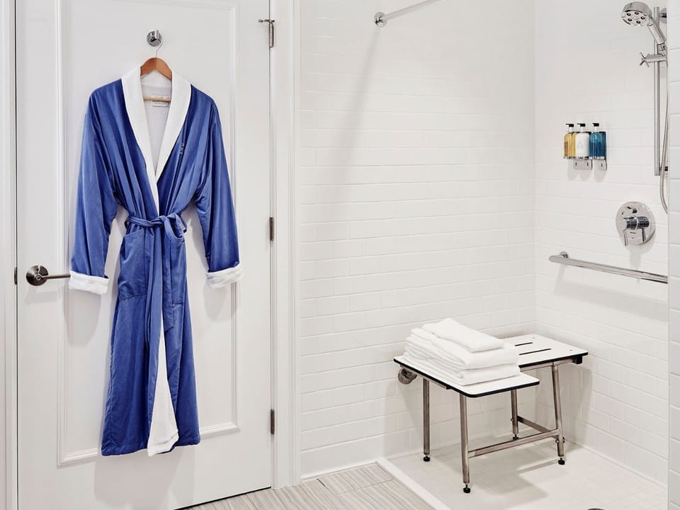 Accessible bathroom designed for comfort, featuring a spacious shower and thoughtful details.