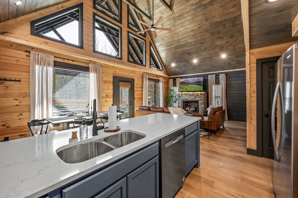 Full kitchen with breakfast bar.  There is a pantry for storage too!