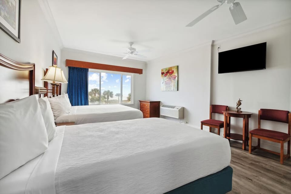Settle into two comfy beds after a beach-filled day.