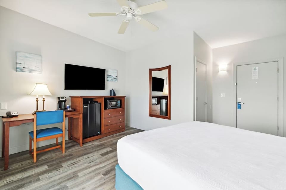 Recharge after beach days in a simple, functional sleeping space.