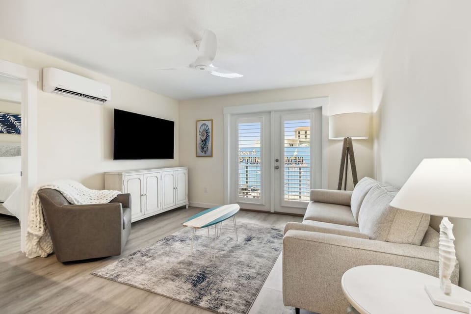 Living area. Exact unit will be assigned upon arrival. Views, colors, and decor may vary.