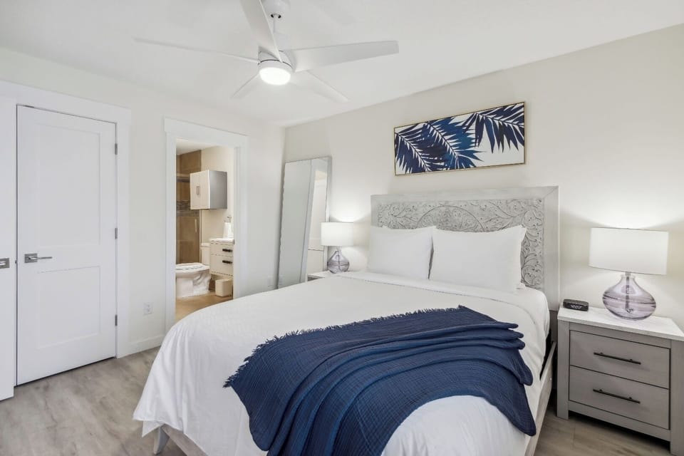 Unwind in crisp linens and calming coastal-inspired decor.