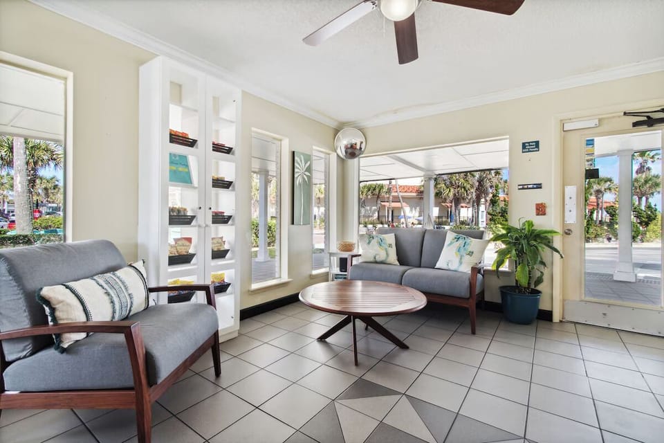 Unwind in the bright lounge before your beach day.