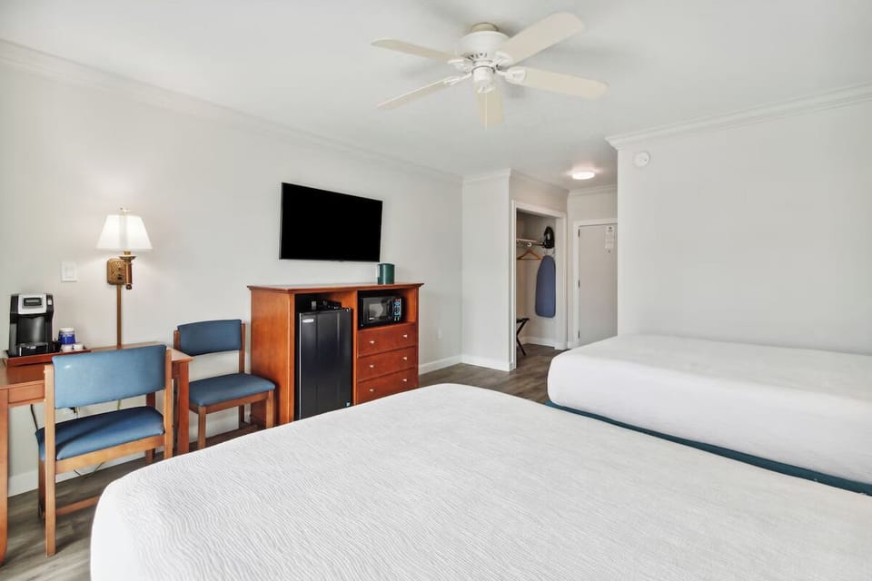 Settle into two plush beds with convenient in-room comforts.