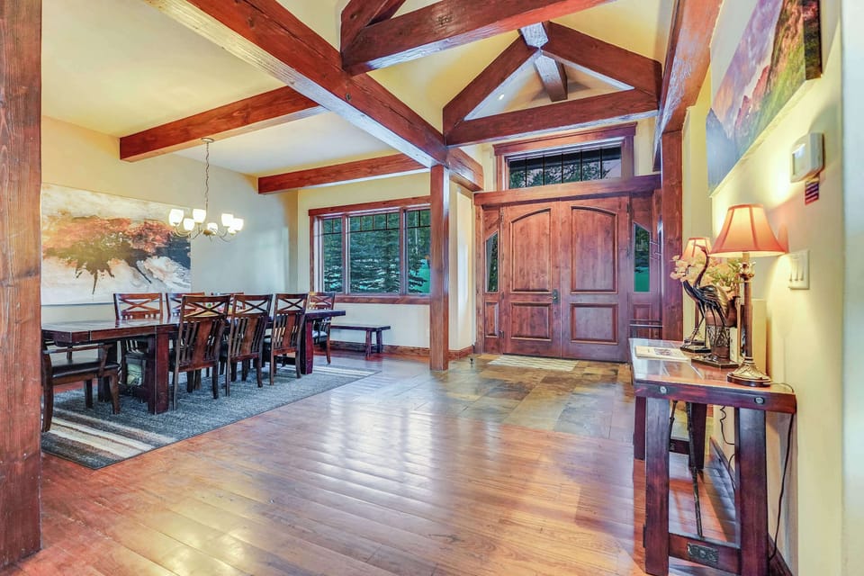 Expansive entry with rough beams throughout to reflect the mountain ambiance.
