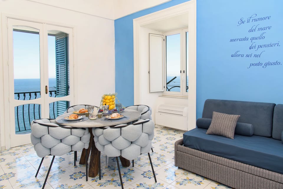 Panoramic Apartment, Balcony, Sea View | Living area