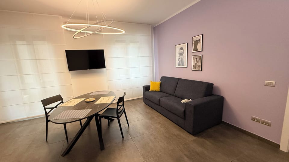 Comfort Apartment | Living area | Flat-screen TV