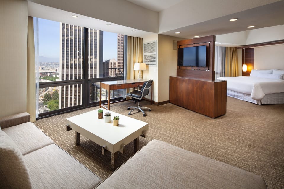 Premium bedding, down comforters, pillowtop beds, in-room safe