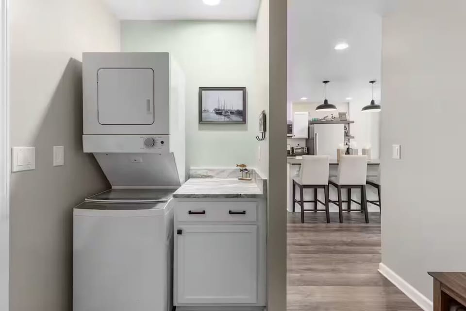 Laundry area with laundry pods provided