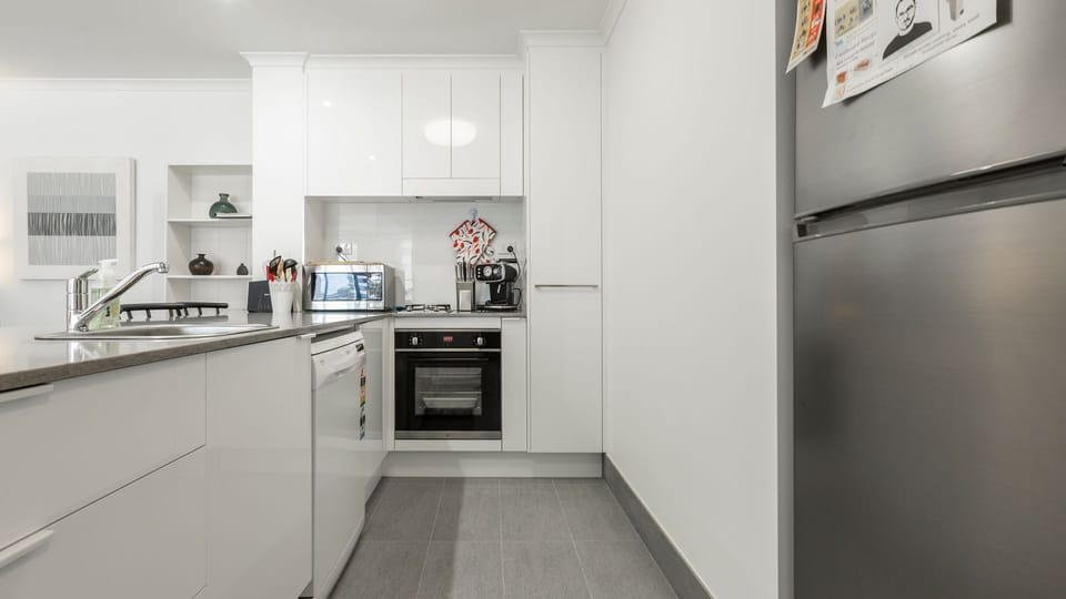 Well equipped kitchen with ample bench space, stainless steel appliances and everything needed for cooking during your stay.